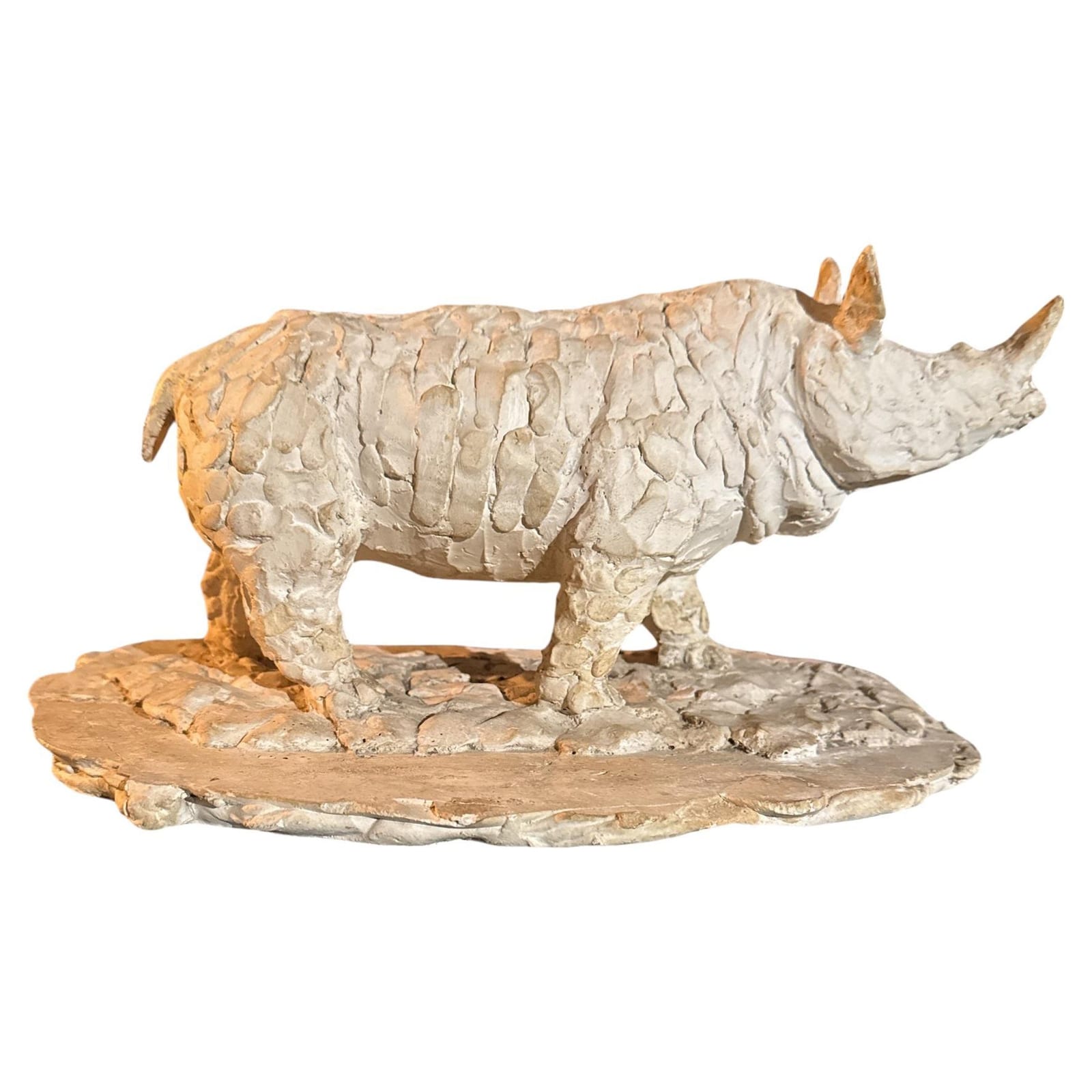 Model in plaster of a rhinoceros by Han Rhem