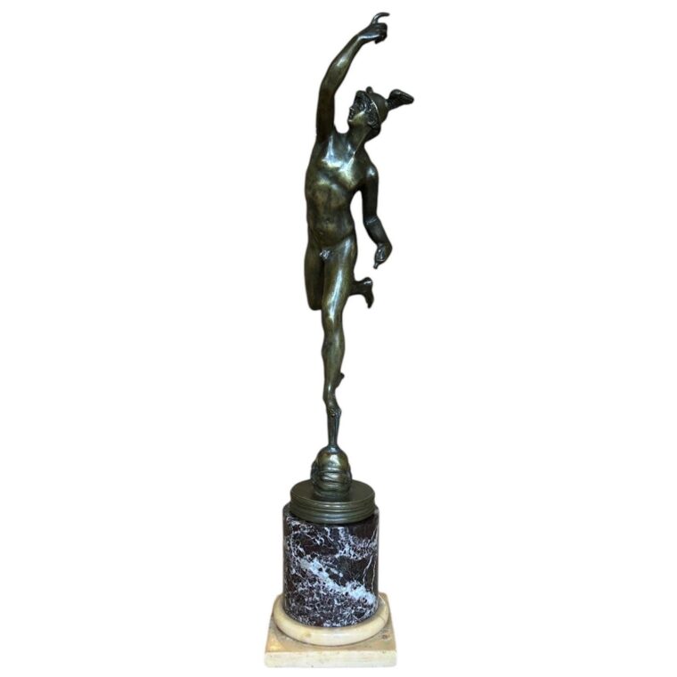 A Grand Tour bronze figure of Mercury ( Hermes ) on a marble collum