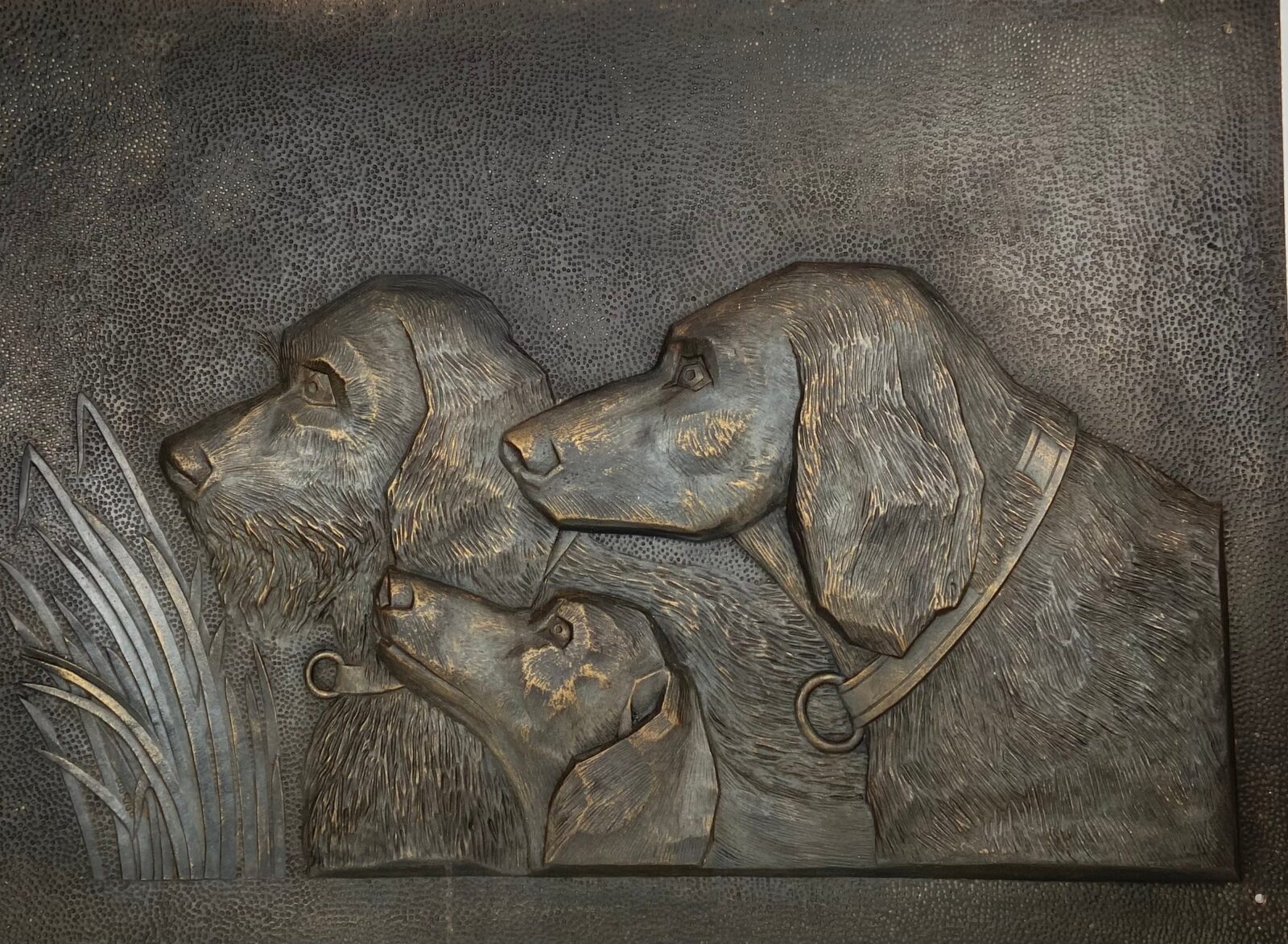 Relief with 3 dog’s heads