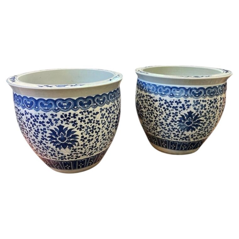 A pair of blue and white ‘lotus’ jardinières late Qing dynasty, early 20th centu