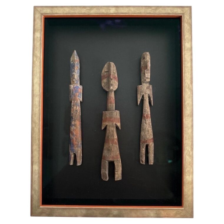 A trio of traditional Ewe carved wooden figures